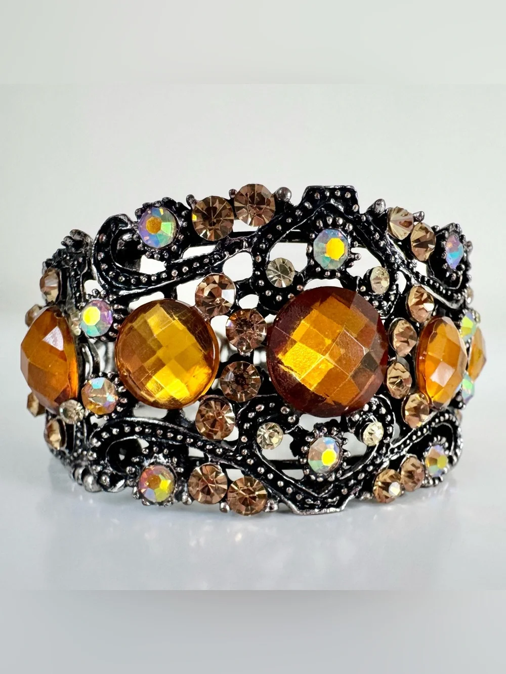 Amber Crystal Metal Cuff Bracelet Scrollwork Iridescent Rhinestone